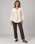 Women's Long Sleeve Shirt in Apricot on a neutral background