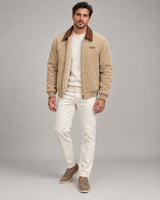 Men's beige corduroy jacket with brown collar - neutral studio portrait