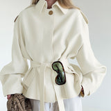 Tamsin | Women's Belted Peplum Trench Coat — view 1