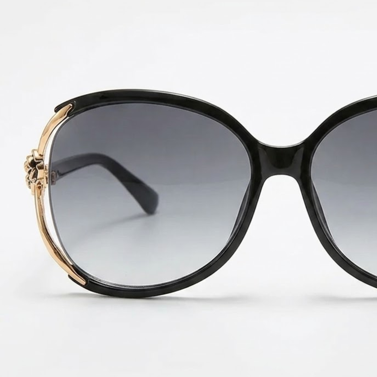 Oversized Women's Sunglasses with Metal Temples and Floral Details — product view