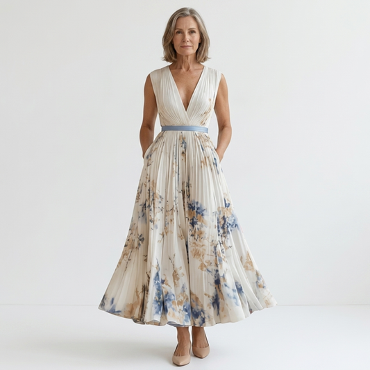 Mid-length floral dress — V-neck and pleated skirt with pockets — White