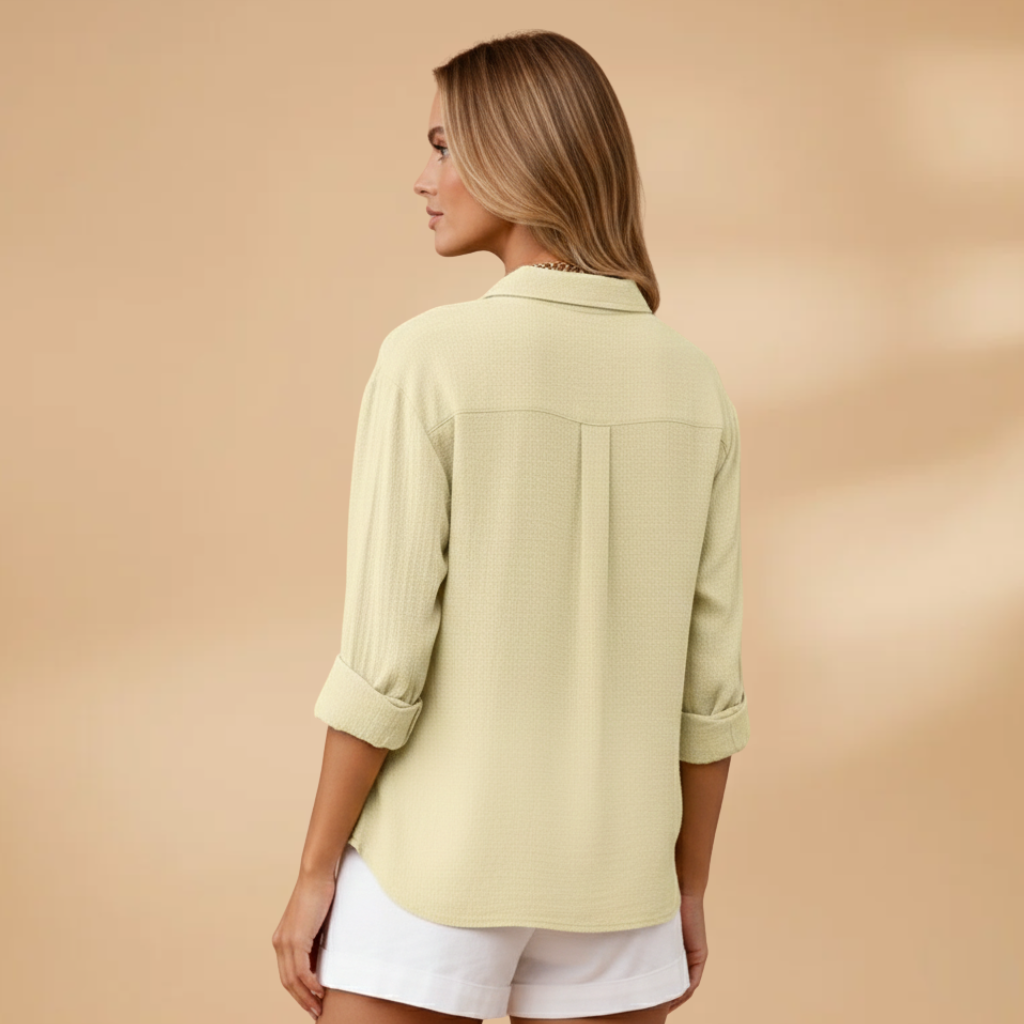 Short buttoned tunic for women — fitted solid top without pockets — product view