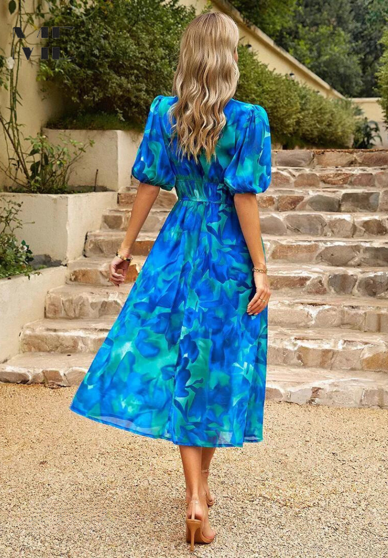 Printed dress for women - flared mid-length model with elastic waist — product view