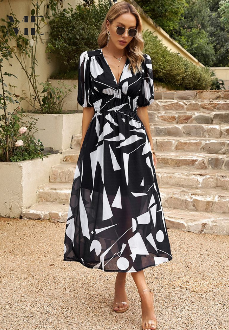 Printed dress for women - flared mid-length model with elastic waist — Black/White