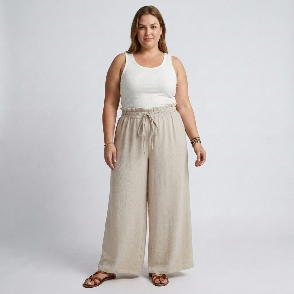 Wide large size pants for women with elastic waistband and drawstring — Beige