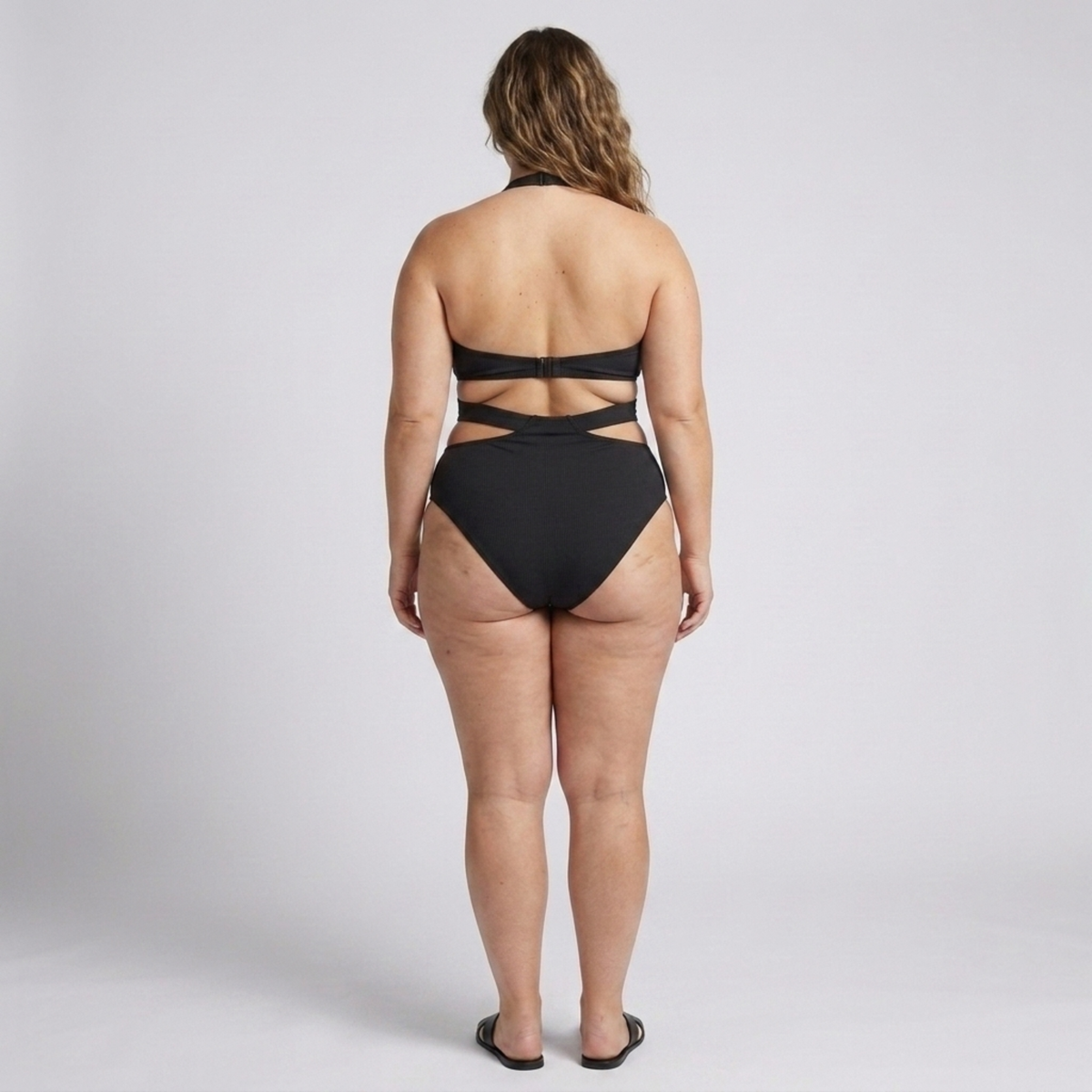 Plus size one-piece swimsuit for women with cut-out back design — product view