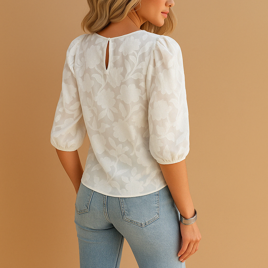 Women's top with round neck, puff sleeves, floral pattern — product view