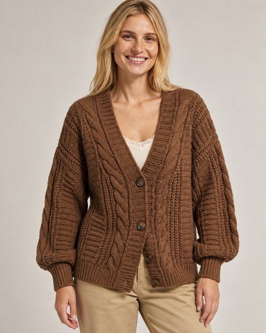 Women's Cable Knit V-Neck Cardigan in Coffee Brown on a neutral background