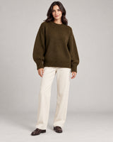 Women's Long Sleeve Jumper - Coral Red in Warm Brown on a neutral background