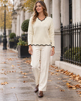 Women's Long Sleeve Jumper in Apricot styled on a London autumn street