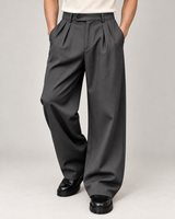 Men's wide-leg pleated trousers in dark grey on a neutral background