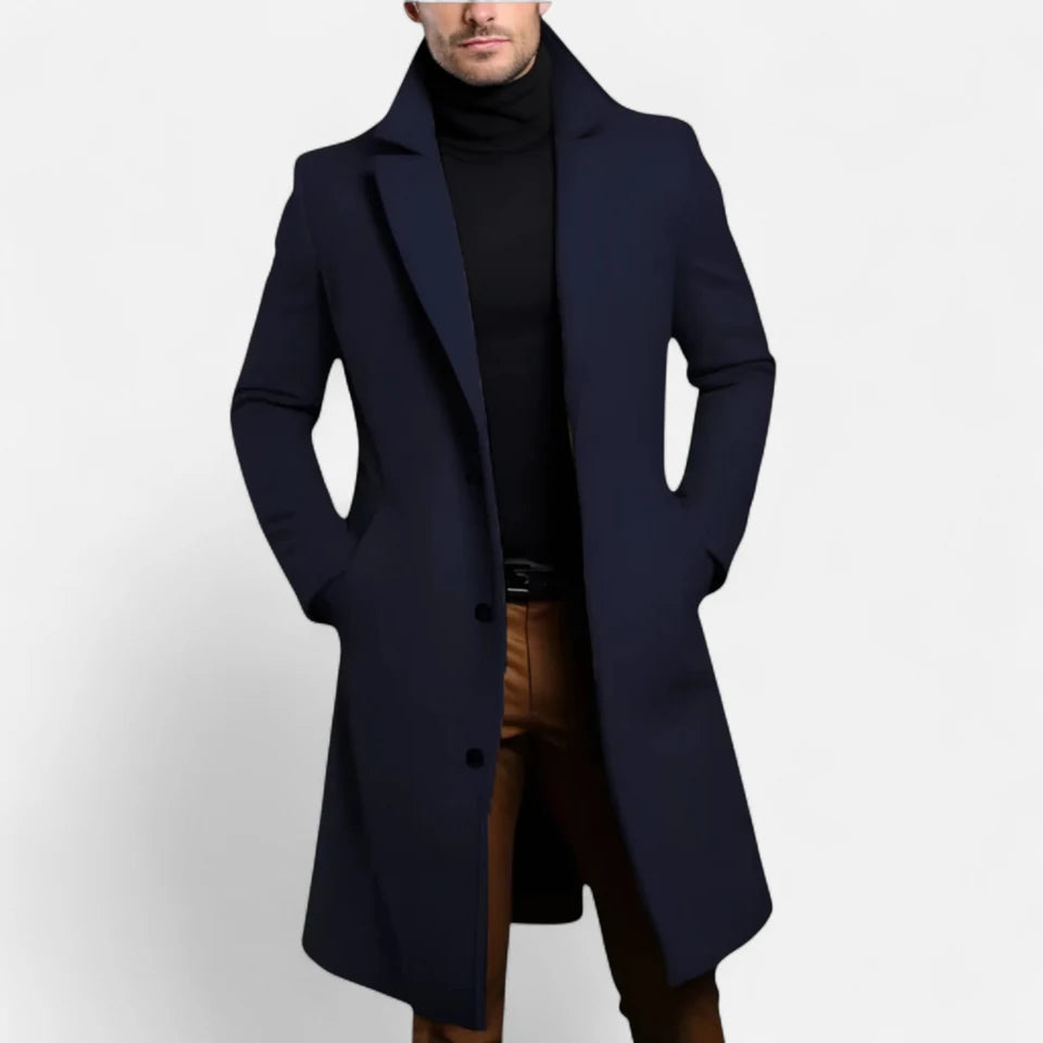 A man wearing a dark coat.